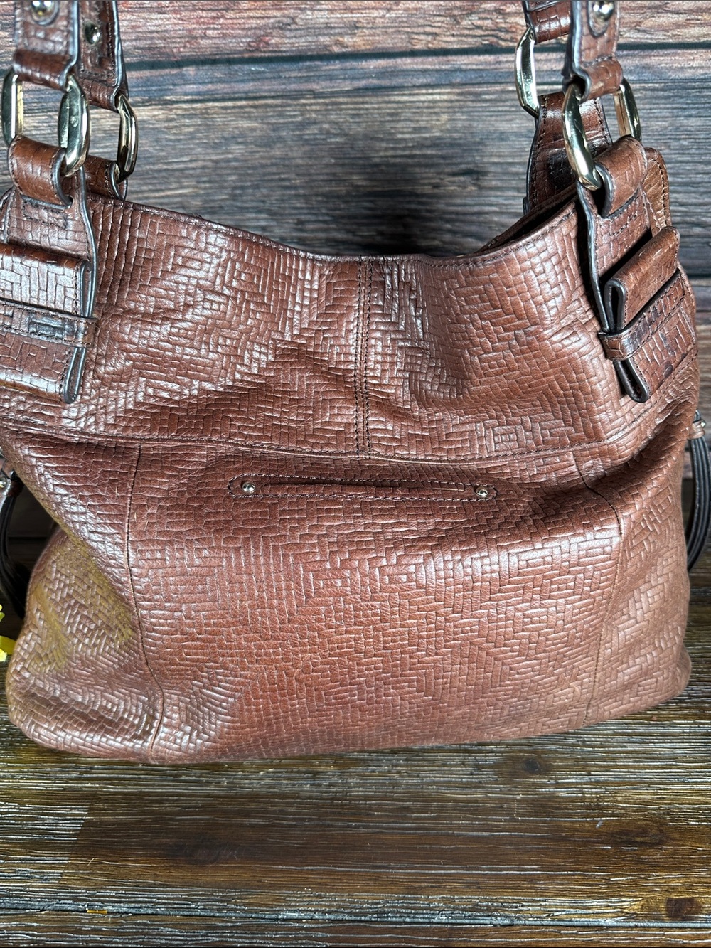 B. Makowsky brown leather shoulder bag with a textured, woven embossed pattern. - Picture 4 of 10